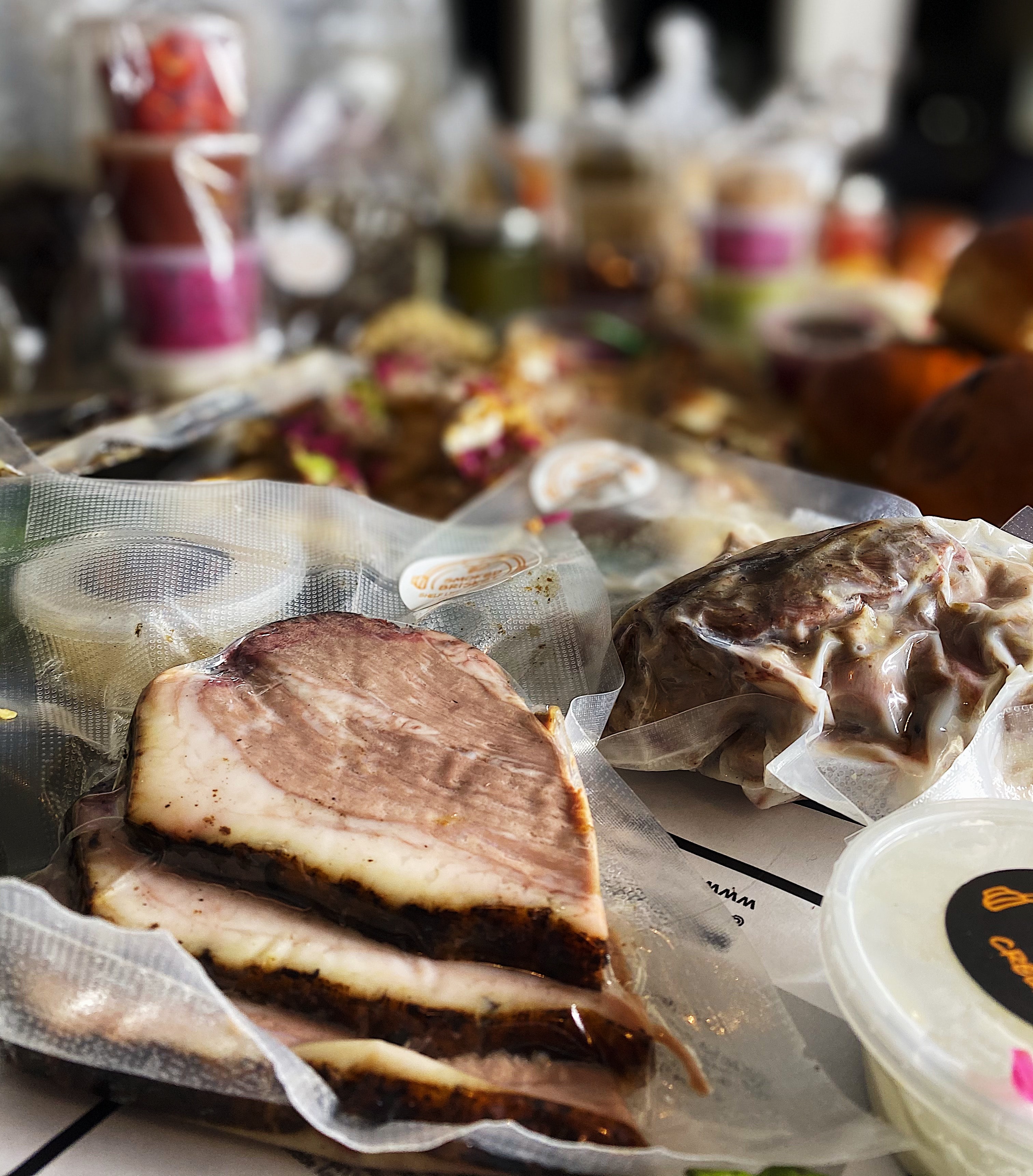 Vac-packed smoked brisket and condiments from Cue Point at home
